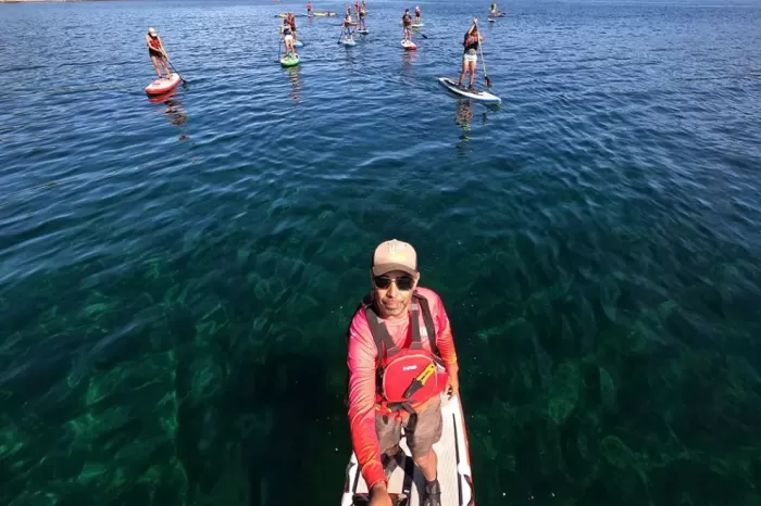 Turismo activo: El furor del stand up paddle en una bajada desde Villa El Chocón